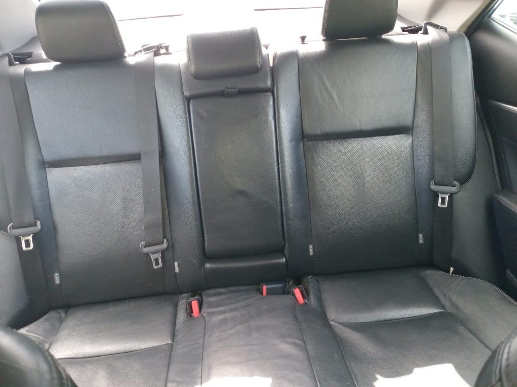 Three back seats with seatbelts